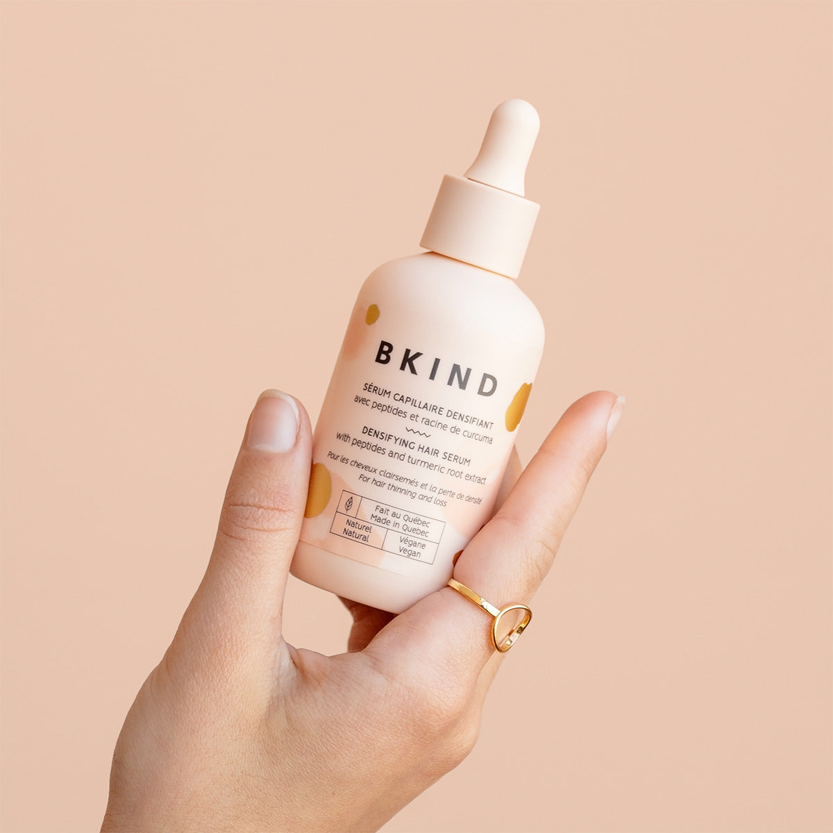 Sérum capillaire densifiant avec peptides et racine de curcuma